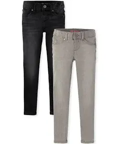 NWT gray pair and black pair, skinny jeans with adjustable waist band.